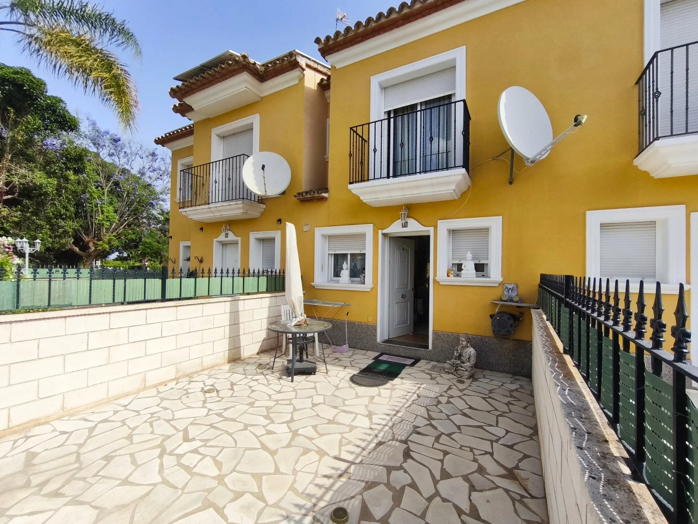 Two-bedroom townhouse with communal pool