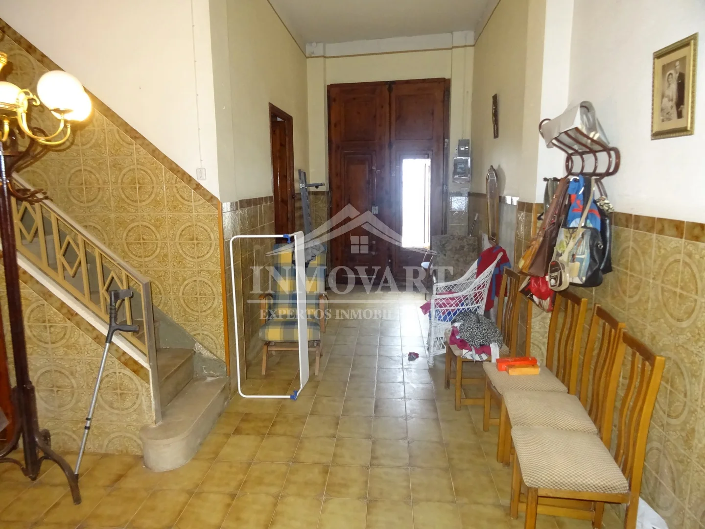 Casa de tres plantas para reformar con terraza
