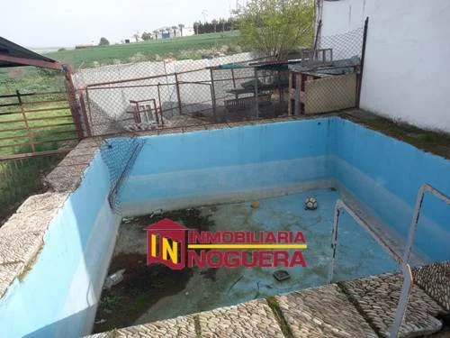 Parcela cultivable en Écija con dos casas