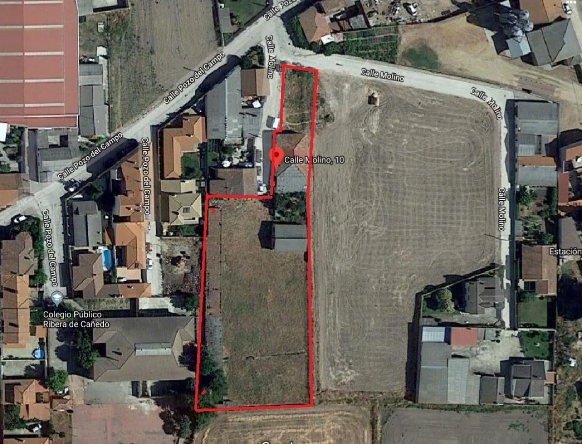 Terreno urbano con casa existente