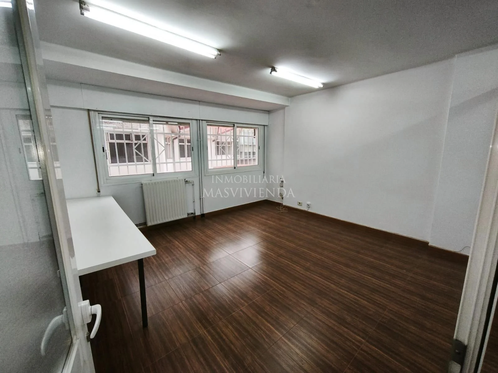 Traviesas office with two rooms
