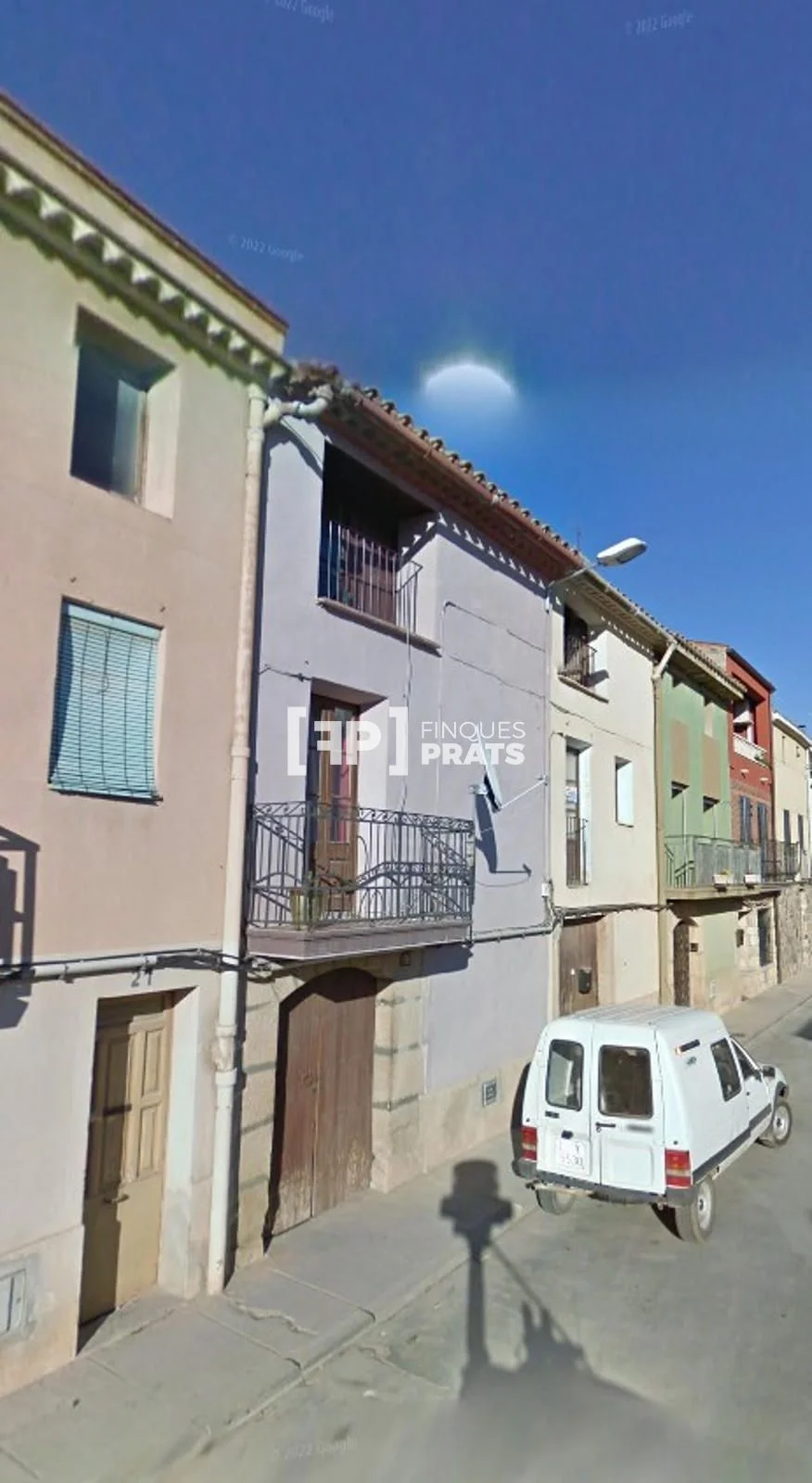 Stopped-build townhouse with communal pool