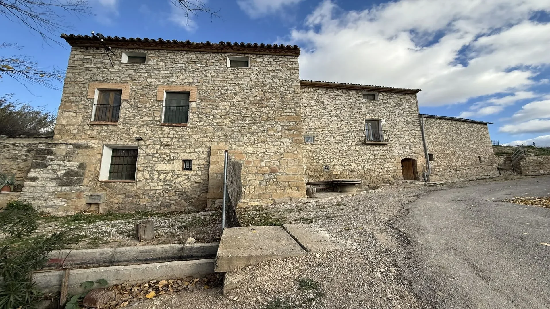 Restored historic masía with olive grove