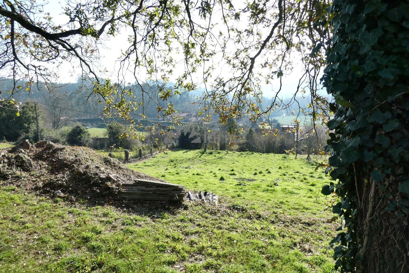 Urban plot near Laracha, four-home potential