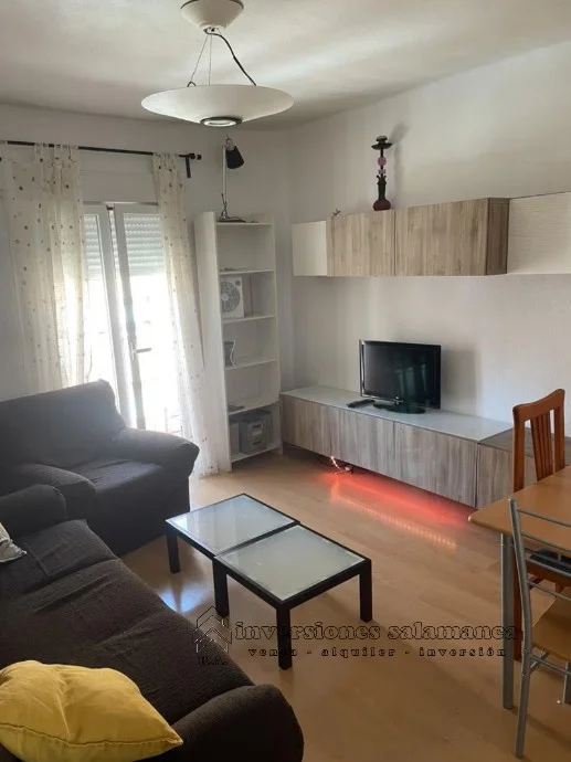 Campus-area flat with rental income