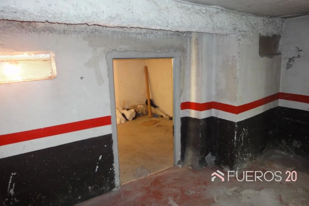 Central garage with storage room