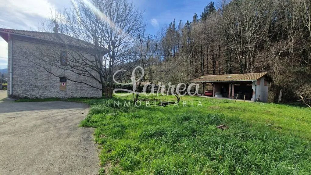 Ground-floor flat with 520 m² land