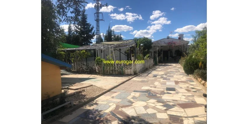 Chalet with caravans on large plot