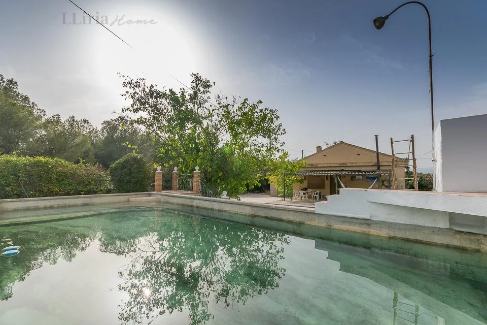 Chalet with large plot and pool