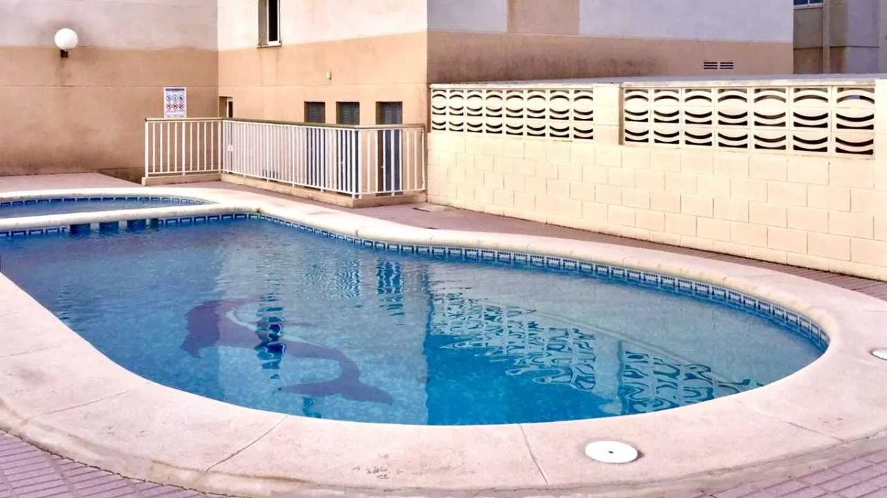 Beach-area flat with pool, 3 bedrooms