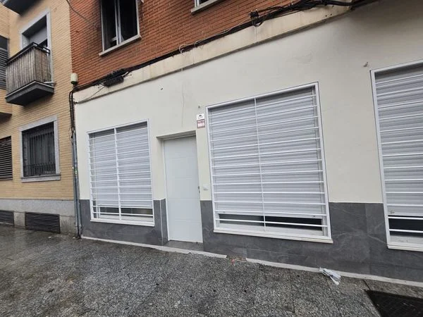 Two-studio property with conversion upside