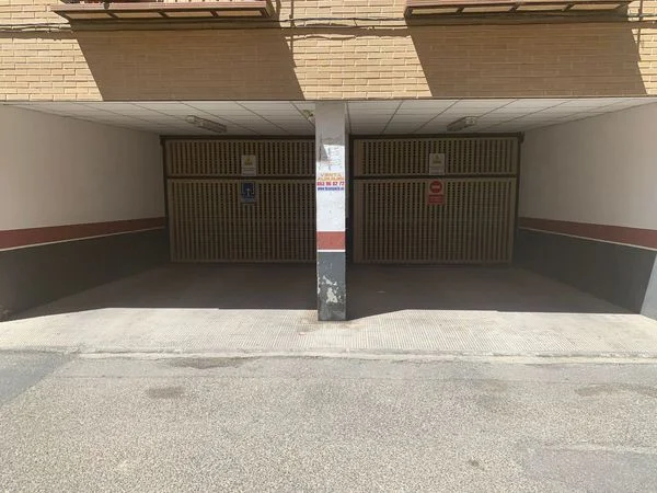 Spacious central garage for large vehicles
