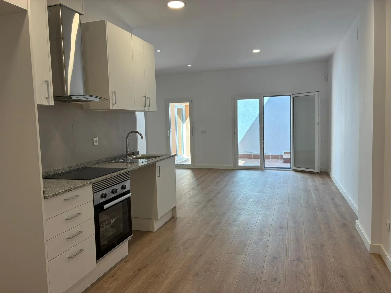 Ground-floor flat with private patios