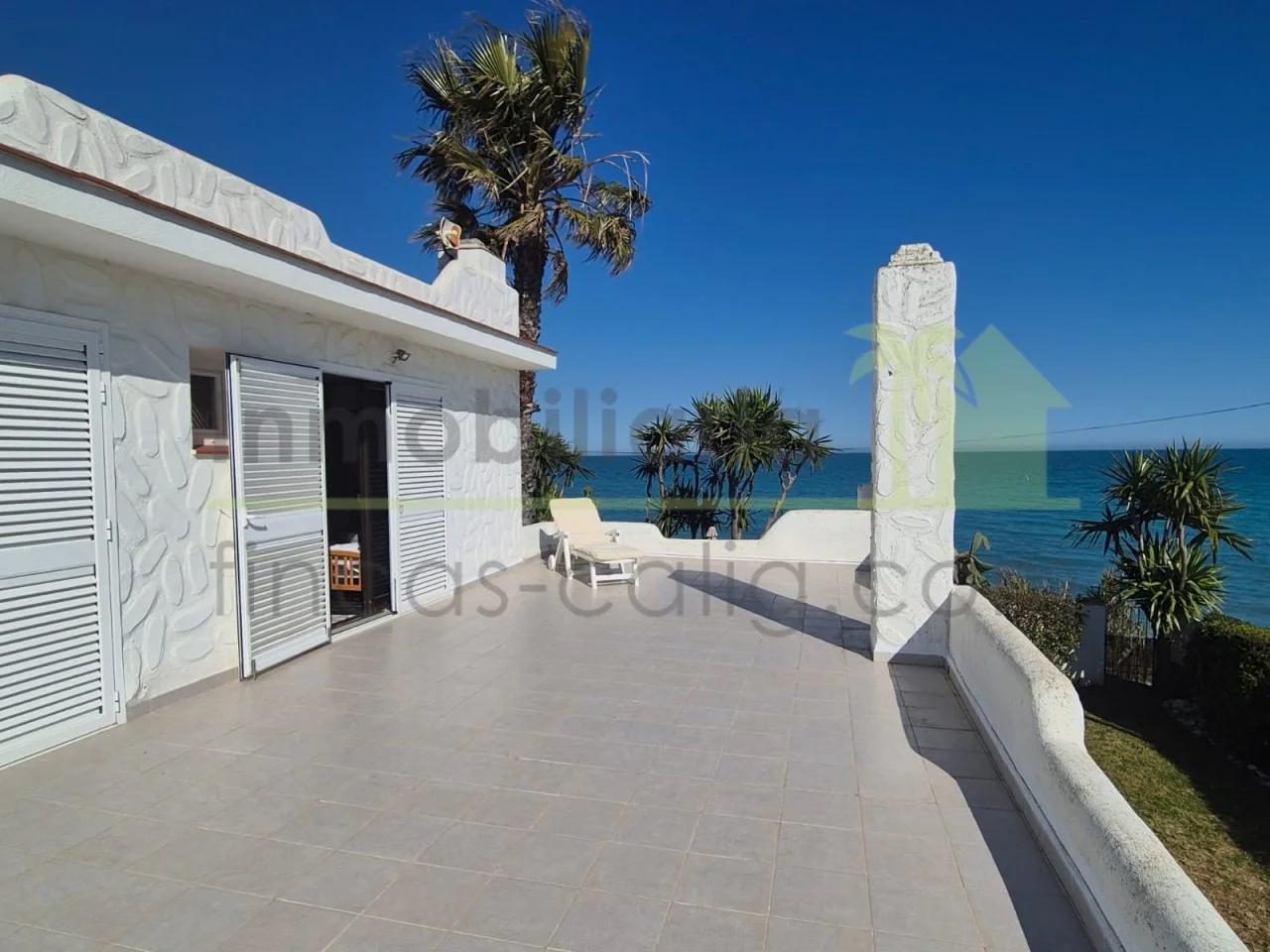 Seafront villa with private cove