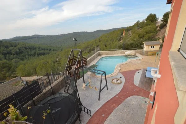 Rural chalet with pool and acreage