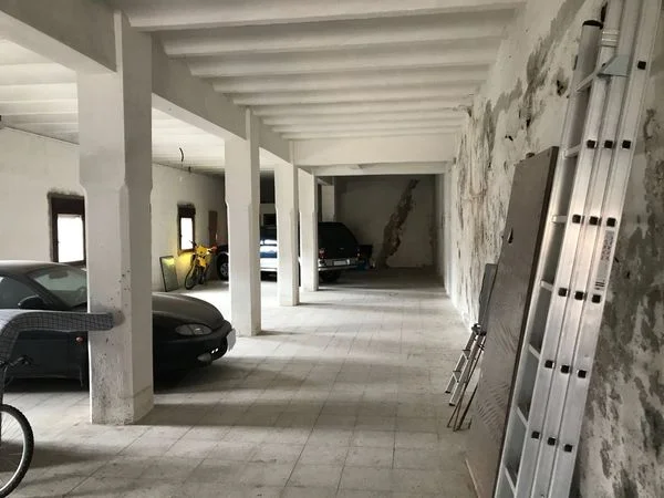 Central garage with bathroom and access
